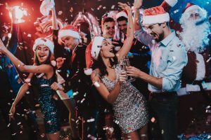 Christmas celebration party with people in festive attire