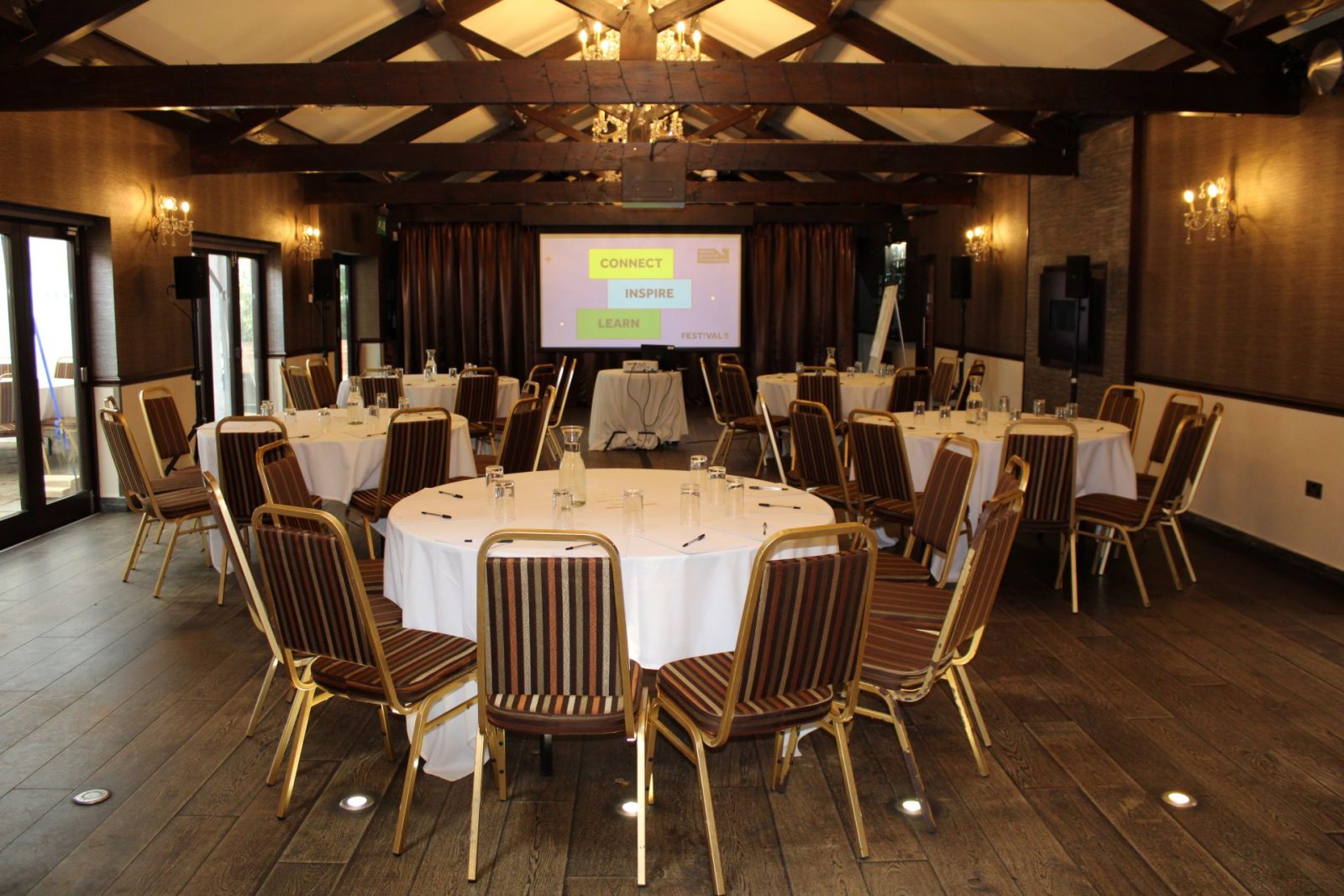 Goosedale meeting room with seating arrangement and projector screen