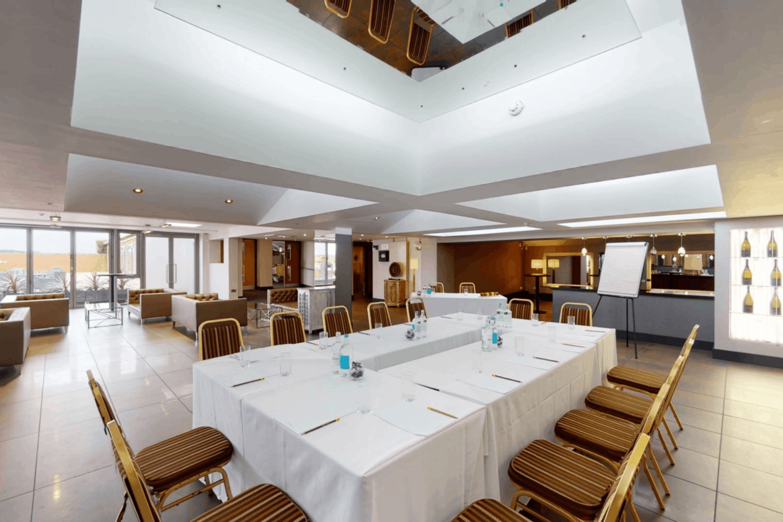 Corporate conference room setup with meeting table and chairs