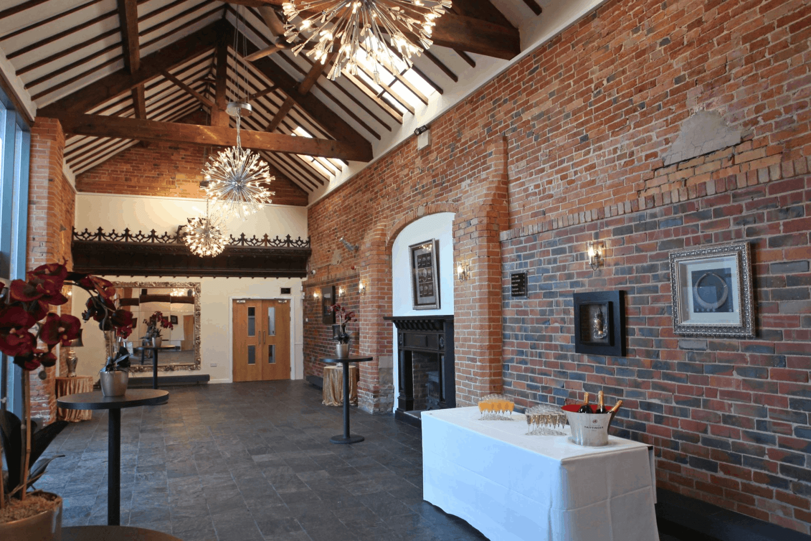 Crystal Hall with brick walls and chandeliers