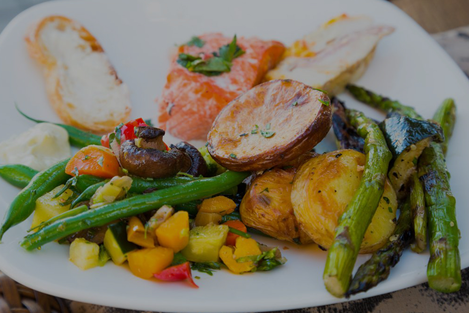 Plated gourmet meal with roasted vegetables
